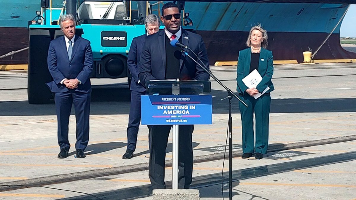 Environmental Protection Agency Administrator Michael Regan announces the launch of the clean ports program Wednesday in Wilmington. Behind him are Wilmington Mayor Bill Saffo, Gov. Roy Cooper and North Carolina State Ports Authority Board of Directors Chair Susan Rabon. Photo: Jennifer Allen