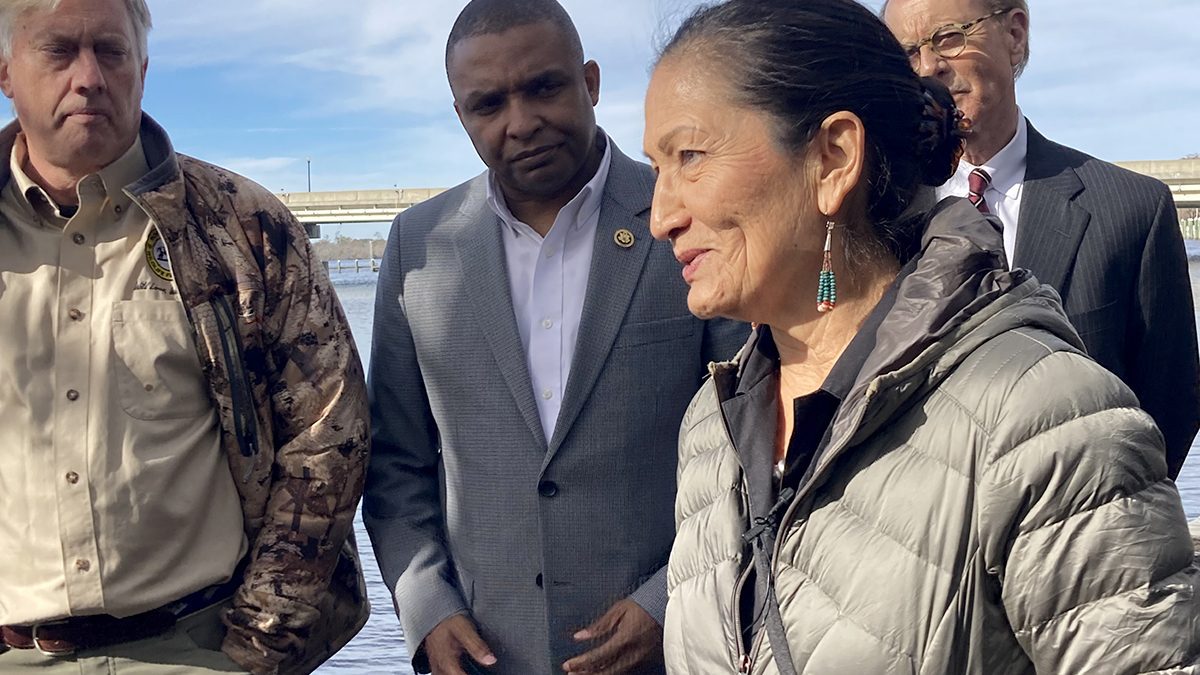 U.S. Department of the Interior Secretary Deb Haaland speaks Thursday as North Carolina Wildlife Federation CEO Tim Gestwicki, left, U.S. Rep Don Davis, D-N.C., Tyrrell County Manager David Clegg stand with her on the Pocosin Lakes boardwalk. Photo: Catherine Kozak