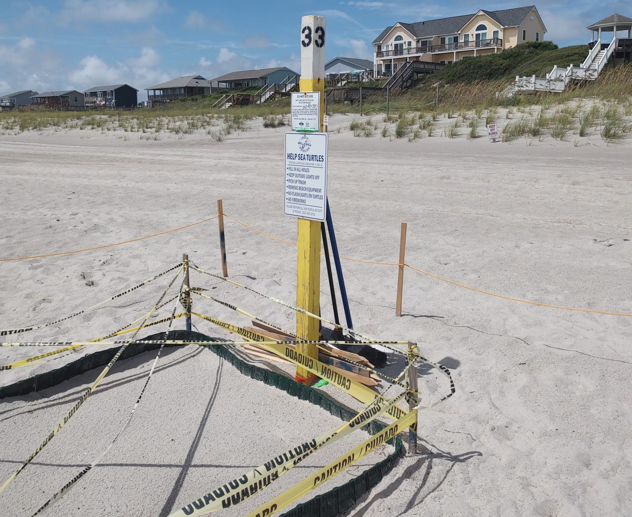 A sea turtle nest in Emerald Isle is cordoned off before the turtles hatch  in late summer of 2023. Photo: Jennifer Allen