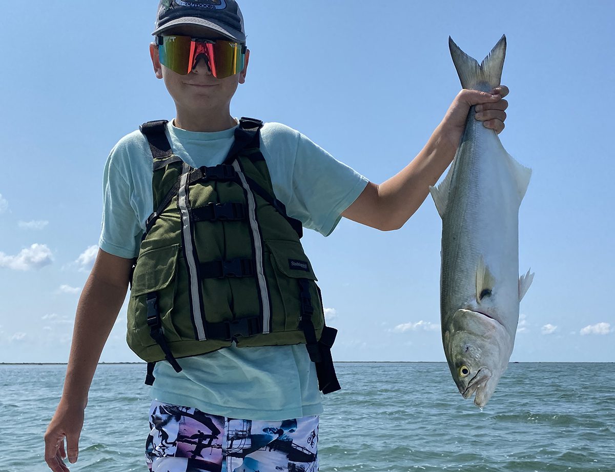 Bluefish will take a live mullet with gusto as evidenced angler Emerson Ellis.