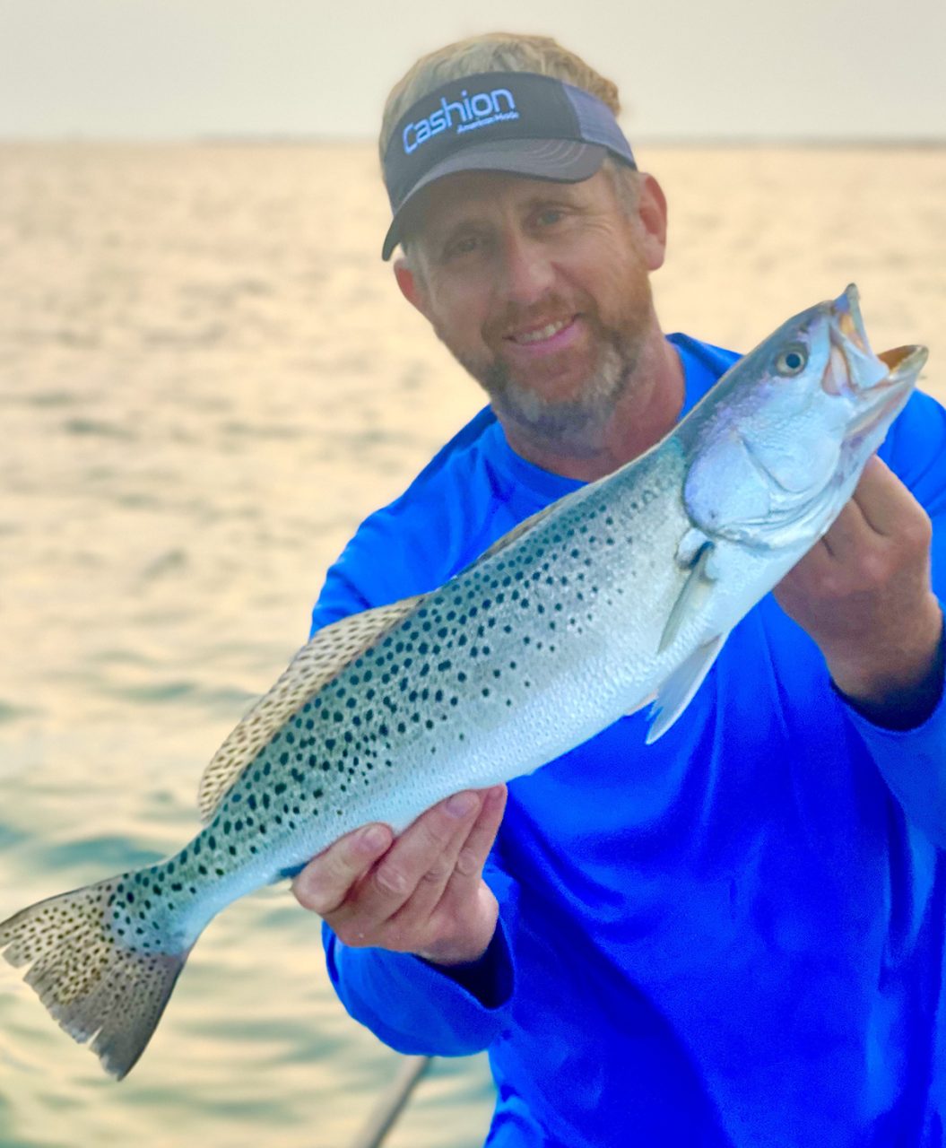 Rick Patterson uses his knowledge of live shrimp behavior in the water as when he wrangled this lovely speckled trout.