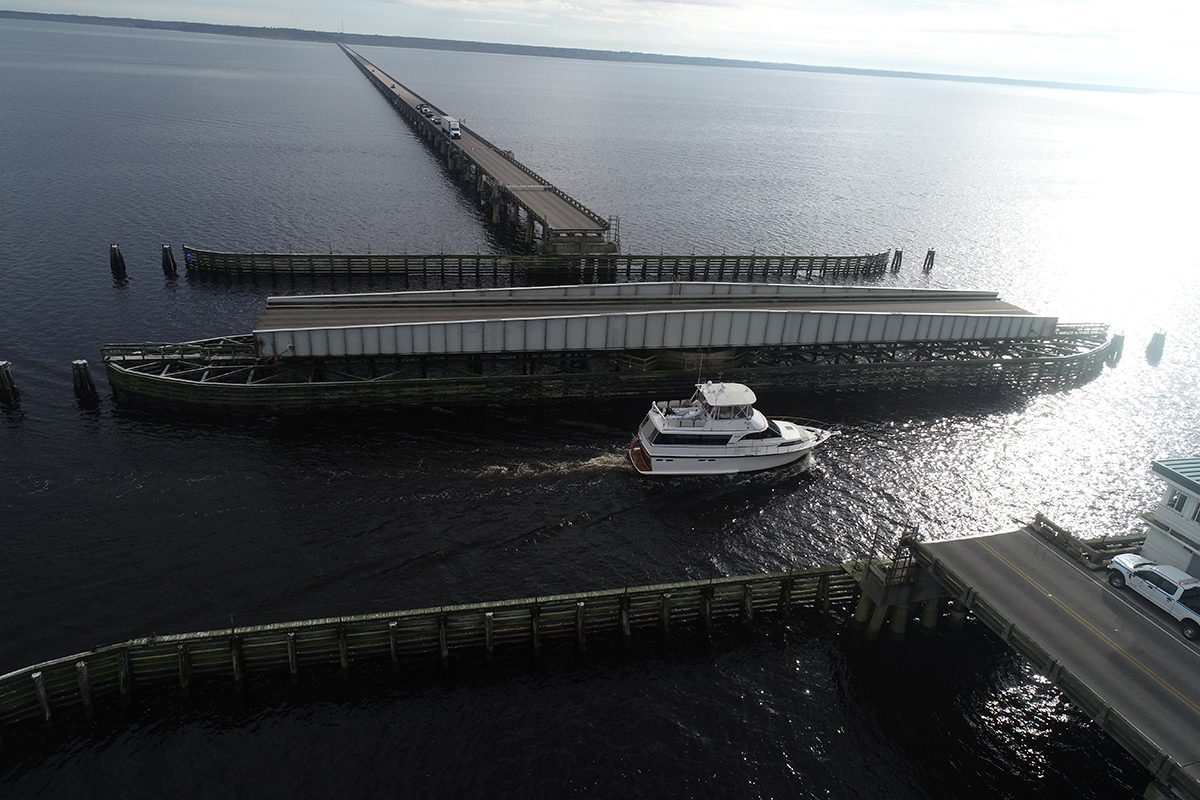 The Lindsay C. Warren Bridge over the Alligator River swings open for a pleasure craft. Photo: NCDOT