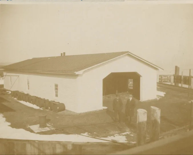 This is a view looking down from the USLS tender Jessamine at the gas plant that was located at the Long Point Light Station , March 1893. Source: Records of the U.S. Coast Guard (RG 26), National Archives- College Park (#45694195)