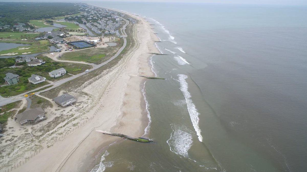 The Bald Head Island groin field consists of 13 sand-filled geotextile tubes extending seaward from the beach. Photo: Village of Bald Head Island