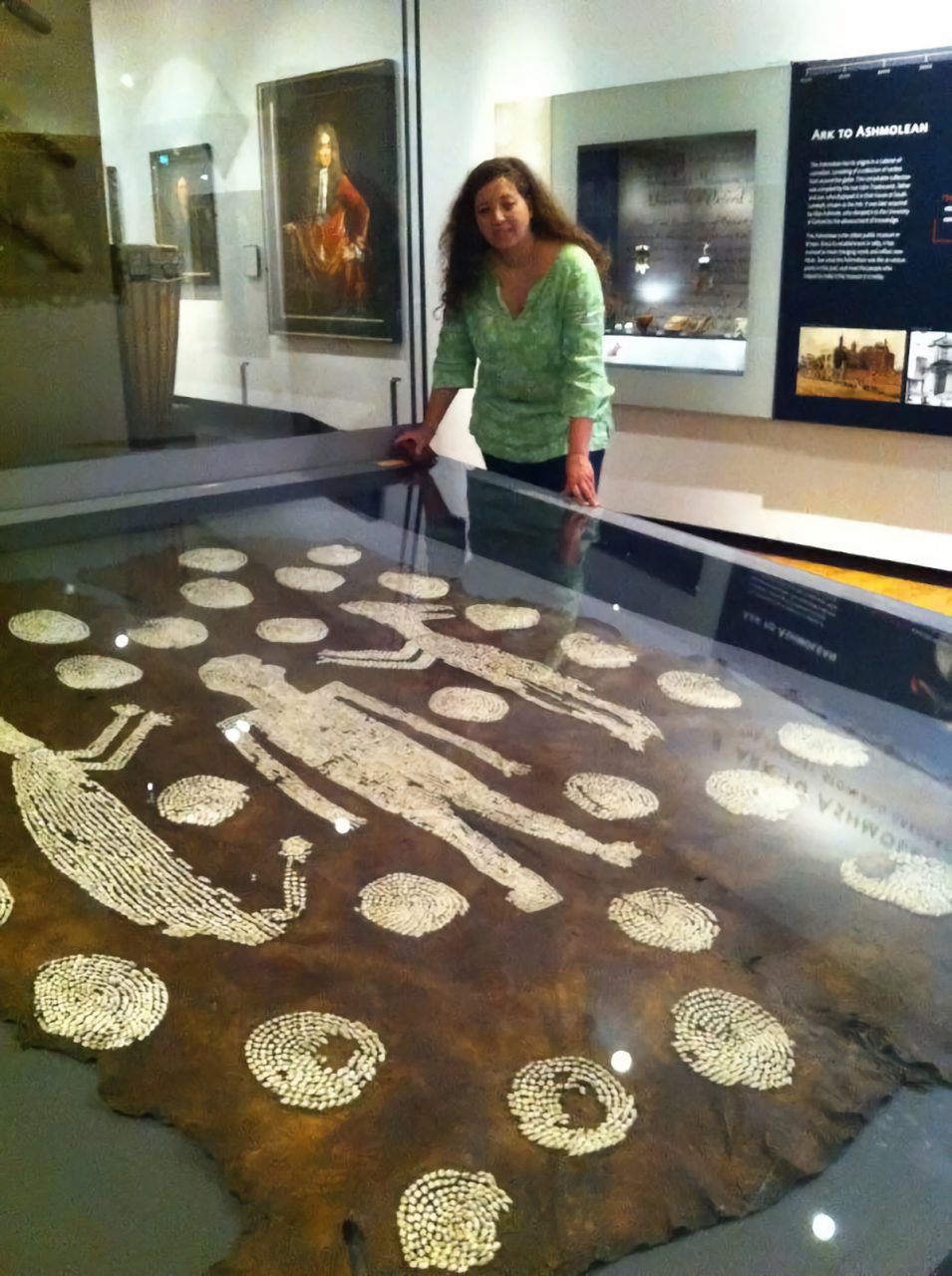 Dr. Gabrielle Tayac, shown here in 2013 when she was a historian and curator at the Smithsonian National Museum of the American Indian, visits Powhatan's Mantle at the Ashmolean Museum in Oxford, England. Photo: Courtesy Dr. Tayac