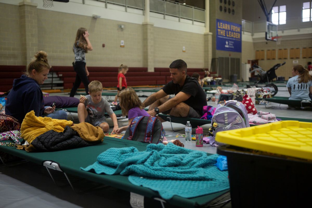 Around 30 people take shelter at the Wallace Creek Fitness Center on Marine Corps Base Camp Lejeune, Sept. 5, 2019, while waiting for Hurricane Dorian to pass. Photo: Sgt. Breanna Weisenberger, U.S. Marine Corps