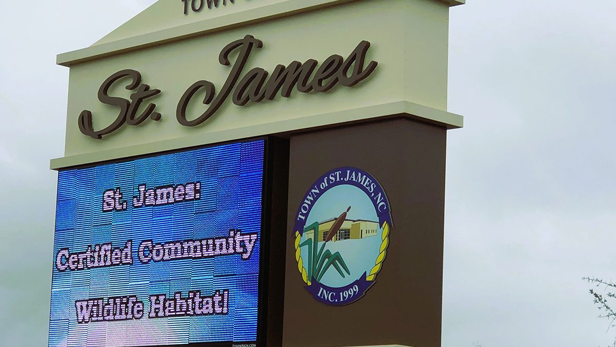 St. James' town sign proclaims the news about the National Wildlife Foundation certification. Photo: Contributed