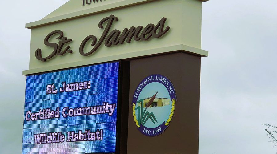 St. James' town sign proclaims the news about the National Wildlife Foundation certification. Photo: Contributed