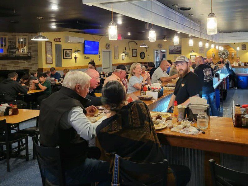 Make quick friends with other seafood lovers in the lively oyster bar and dining room at Jordan's Smokehouse & Seafood in Swansboro. Photo: Contributed