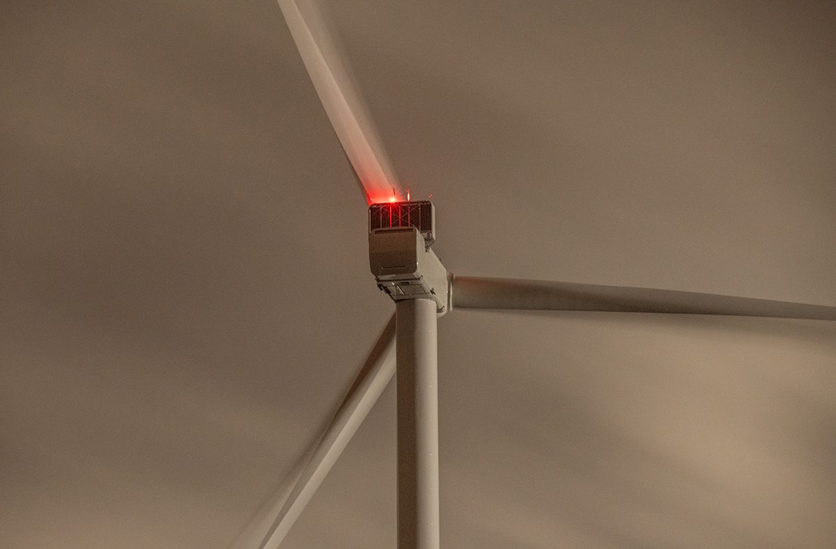 The gearbox of a wind turbine glows in the night sky Tuesday at Timbermill Wind near Edenton. Photo: Dylan Ray