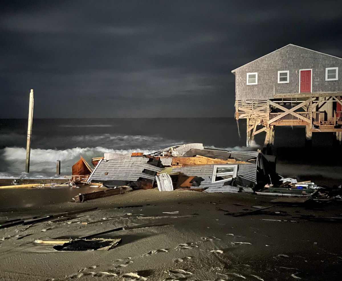 Early morning photo of debris associated with the collapsed house at 23001 G A Kohler Court, Rodanthe. Photo: National Park Service
