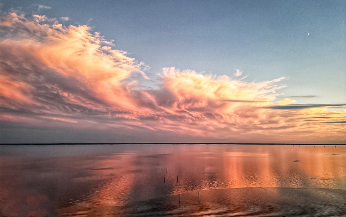 The sun sets over Albemarle Sound in Edenton near the N.C. Highway 32 bridge in this photo submitted by Tom Brennan of Edenton. "For the past couple of years I've been flying my drone over the Albemarle Sound capturing the dramatic cloud formations, sunsets and sunrises," Brennan told Coastal Review. "This time of year the sound becomes impossibly calm with remarkable sunsets."