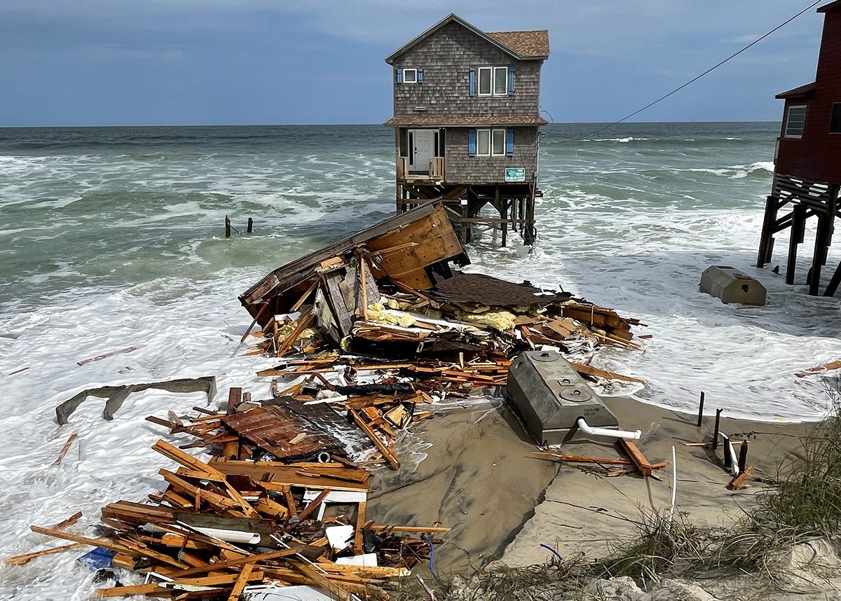 Debris associated with the collapsed house at 23039 G A Kohler Court is strewn along the beach Wednesday at Rodanthe. Photo: National Park Service