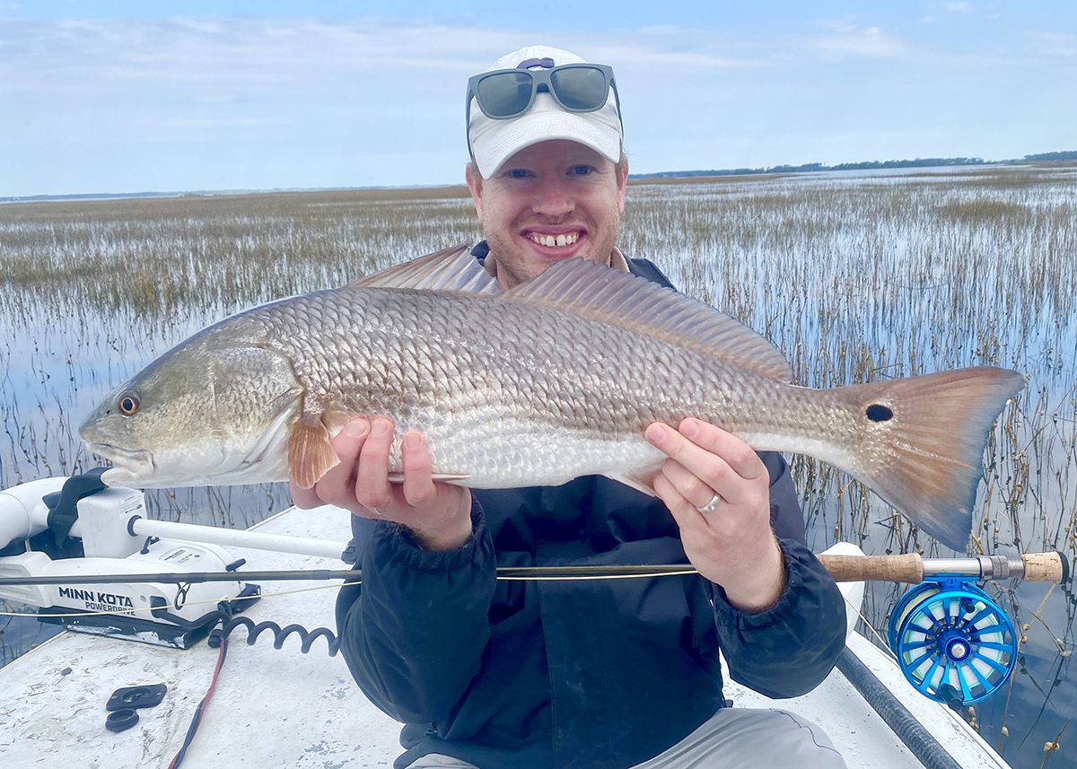 Evan Dintaman of Washington, D.C., found this beautiful redfish tailing in shallow spartina grass flats while fishing with Capt. Gordon.