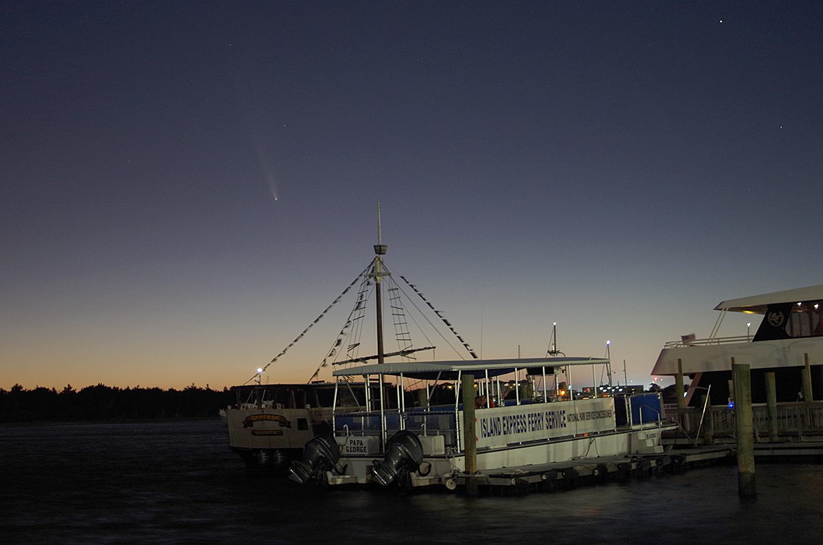 The faint tail of Comet Tsuchinshan-ATLAS pointing away from the setting sun is visible Sunday evening over Taylors Creek in Beaufort. NASA says the "dirty snowball's" appearance is "a once-in-80,000-years sight." The comet believed to be from the Oort Cloud at the edge of our Solar System was expected to swing close by at about 44 million miles from Earth -- its closest pass -- on Saturday. Discovered in 2023, it is named for both China’s Tsuchinshan, or Purple Mountain, Observatory and an Asteroid Terrestrial-impact Last Alert System, or ATLAS, telescope in South Africa. Photo: Mark Hibbs