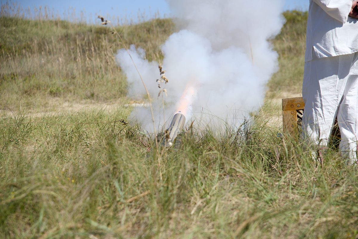 Crews fire the Lyle gun to a practice mast 200 yards away. Photo: Kip Tabb 