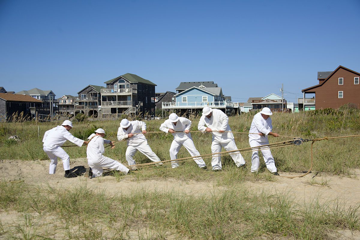 Reenactors pull the line taunt during a practice rescue Oct. 12. Photo: Kip Tabb