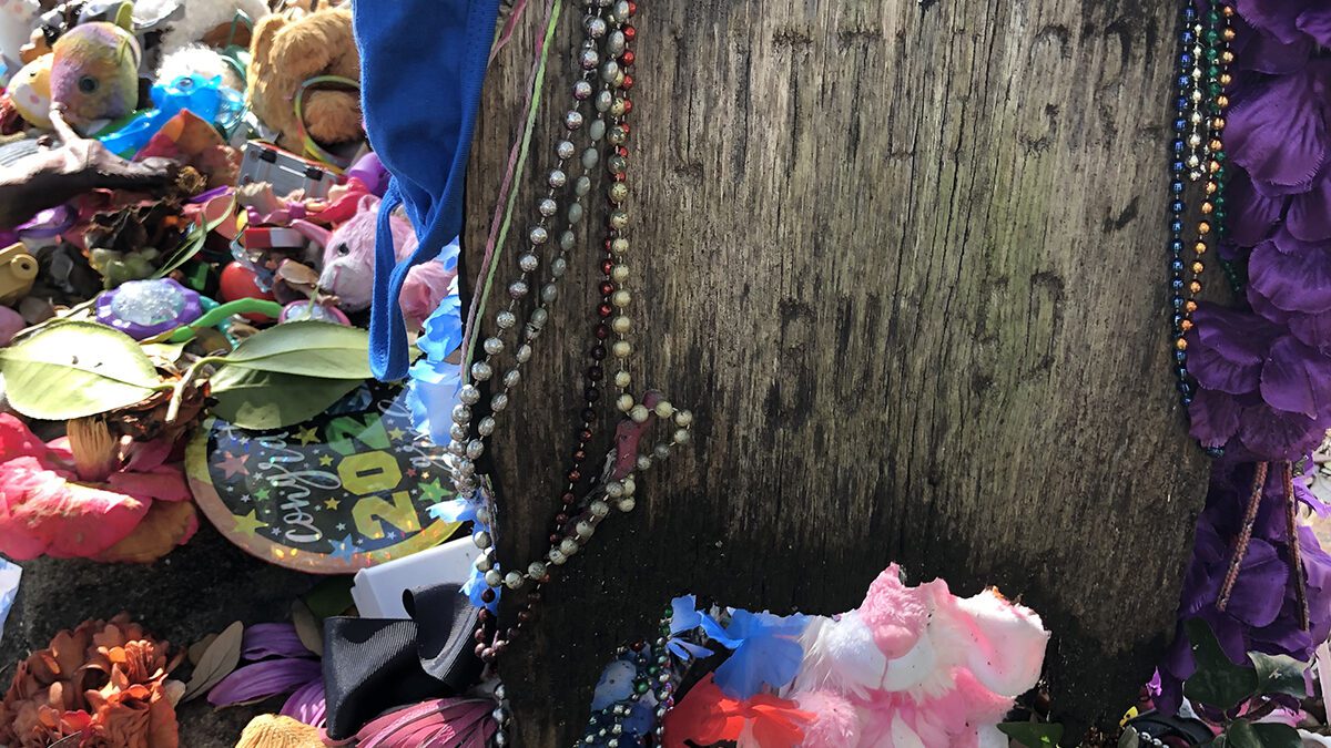 Adornments added by visitors to the girl's gravesite are a longstanding tradition at the Old Burying Ground. Photo: Bright Walker