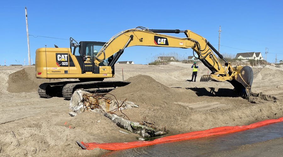 Contractors Bay West, LLC excavate the beach in search of petroleum-contaminated soil Oct. 15 at the Buxton Naval Facility, a Formerly Used Defense Sites property in the Cape Hatteras National Seashore. Photo: Terry Brooks/Corps