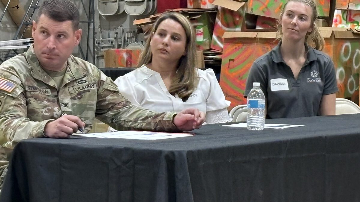 U.S. Army Corps of Engineers Savannah District Commander, Col. Ron Sturgeon, Formerly Used Defense Sites Program Manager Sara Keisler, and Alexandra Jangrell-Tackett, program manager with Dawson, listen to residents Monday during a meeting the Corps hosted at the Fessenden Center in Buxton. Photo: Catherine Kozak