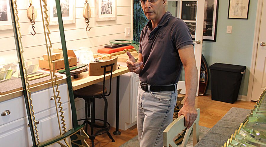 Dan Spinella, shown here in his home workshop in Florida, is replicating original Cape Hatteras Lighthouse lens components as part of the ongoing lighthouse restoration. Photo: John Havel