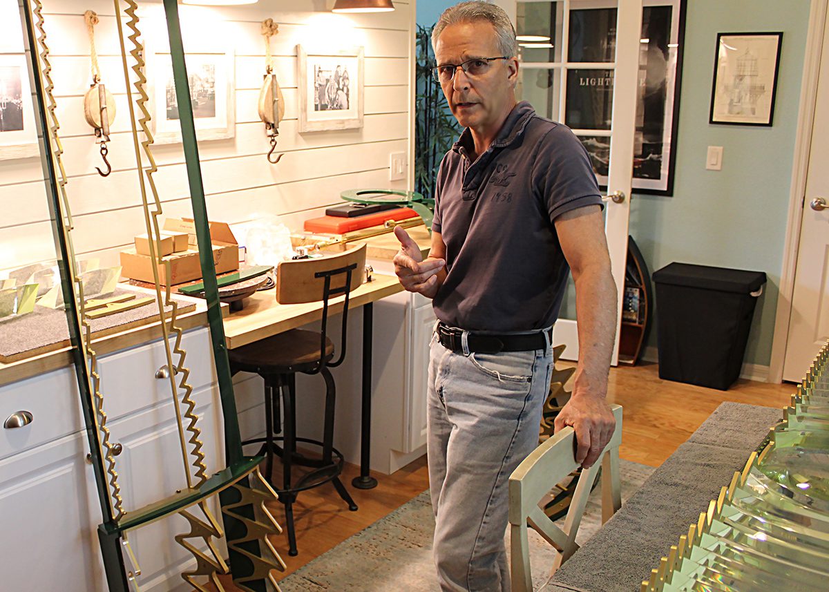 Dan Spinella, shown here in his home workshop in Florida, is replicating original Cape Hatteras Lighthouse lens components as part of the ongoing lighthouse restoration. Photo: John Havel