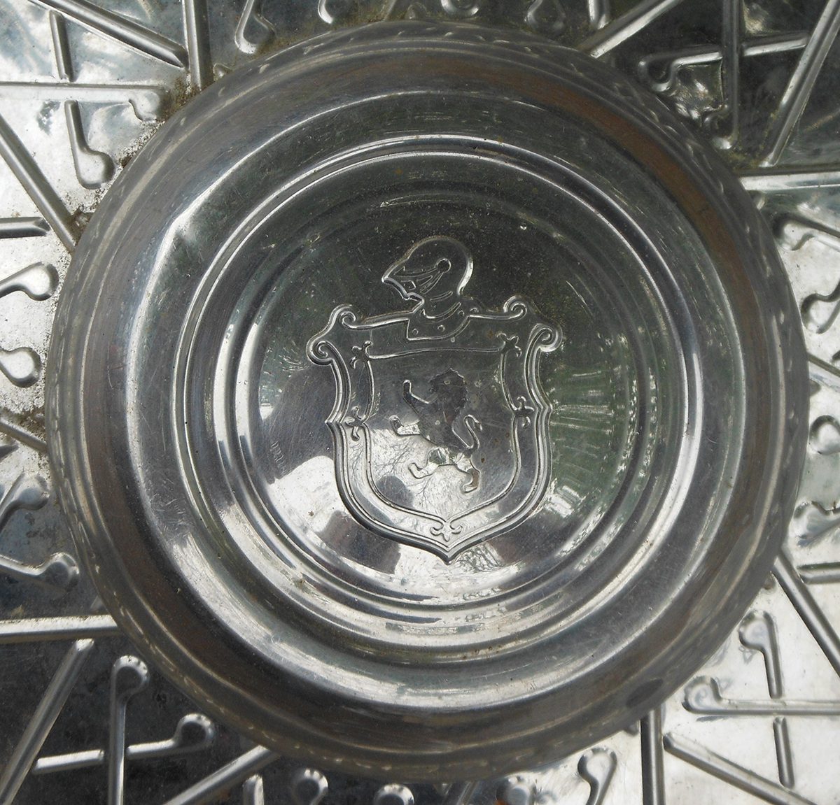 A coat of arms featuring a lion adorns a Lyon hubcap in this undated photo courtesy of the Monmouth County Clerk's Office Archives, Monmouth County, New Jersey.