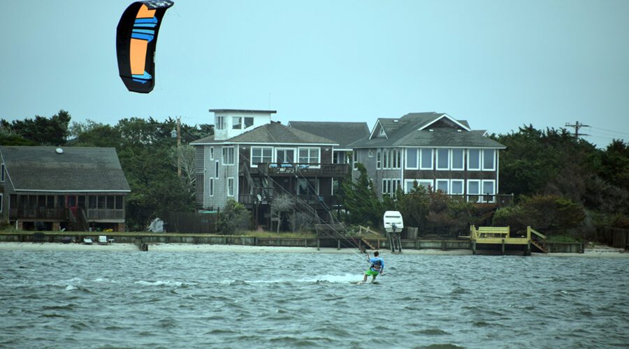 A kitesurfer harnesses the wind in waters near Teaches Hole Channel off Ocracoke Island in 2017. Photo: Mark Hibbs