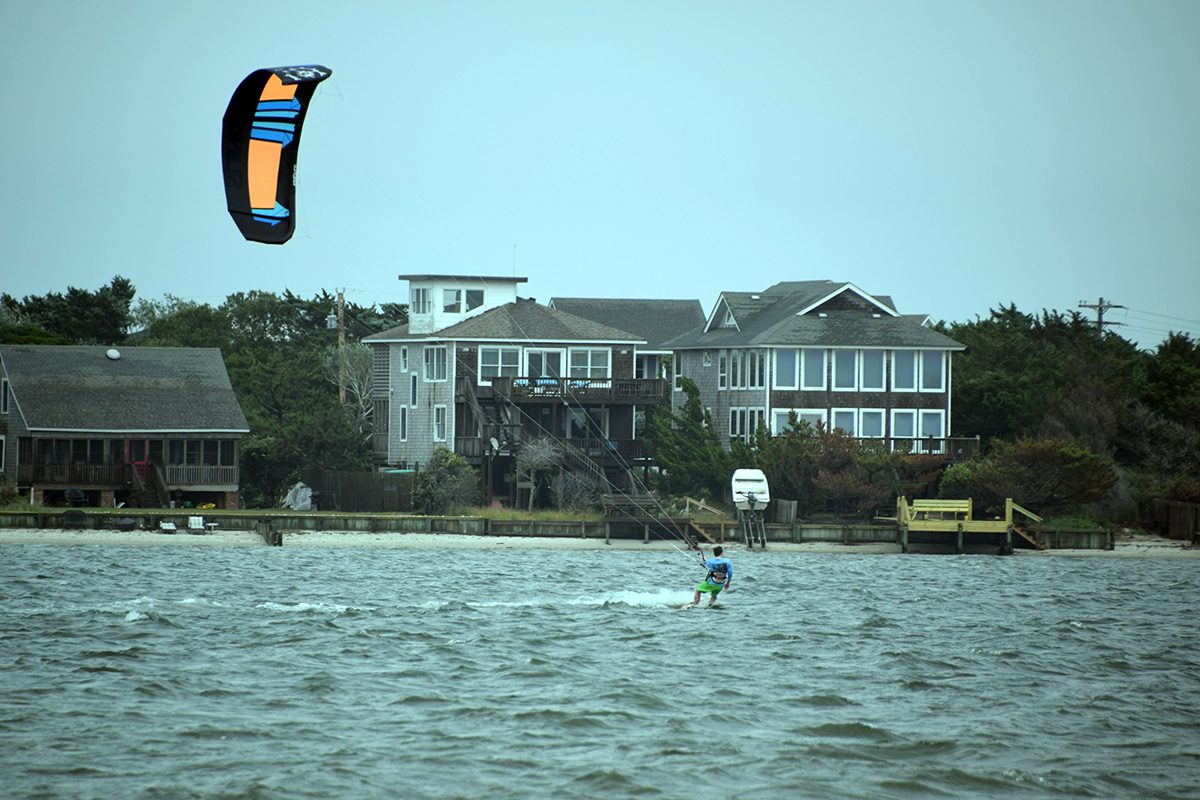 A kitesurfer harnesses the wind in waters near Teaches Hole Channel off Ocracoke Island in 2017. Photo: Mark Hibbs