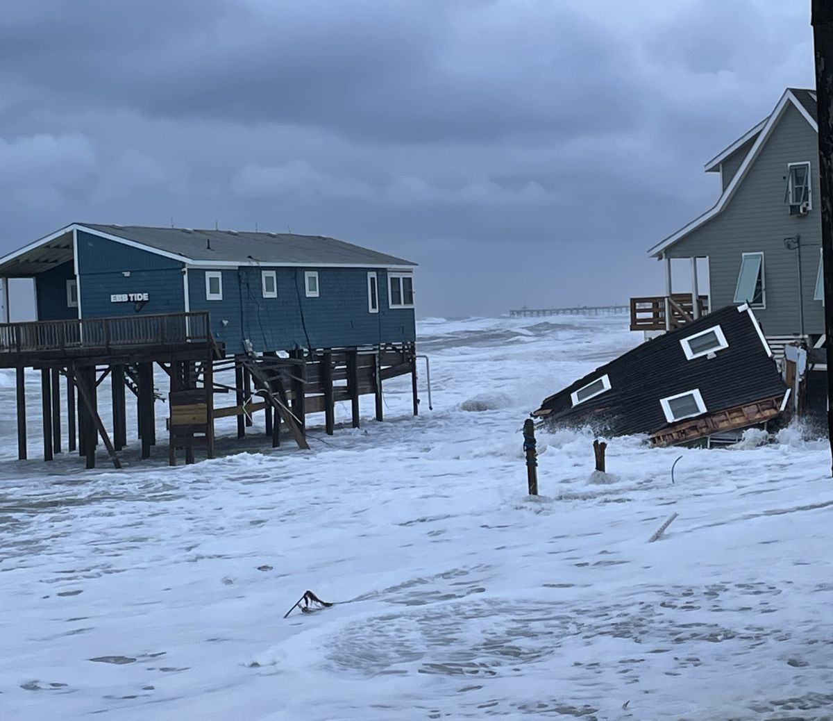 Portion of collapsed house in the water at Surf Side Drive in Rodanthe. Photo: National Park Service