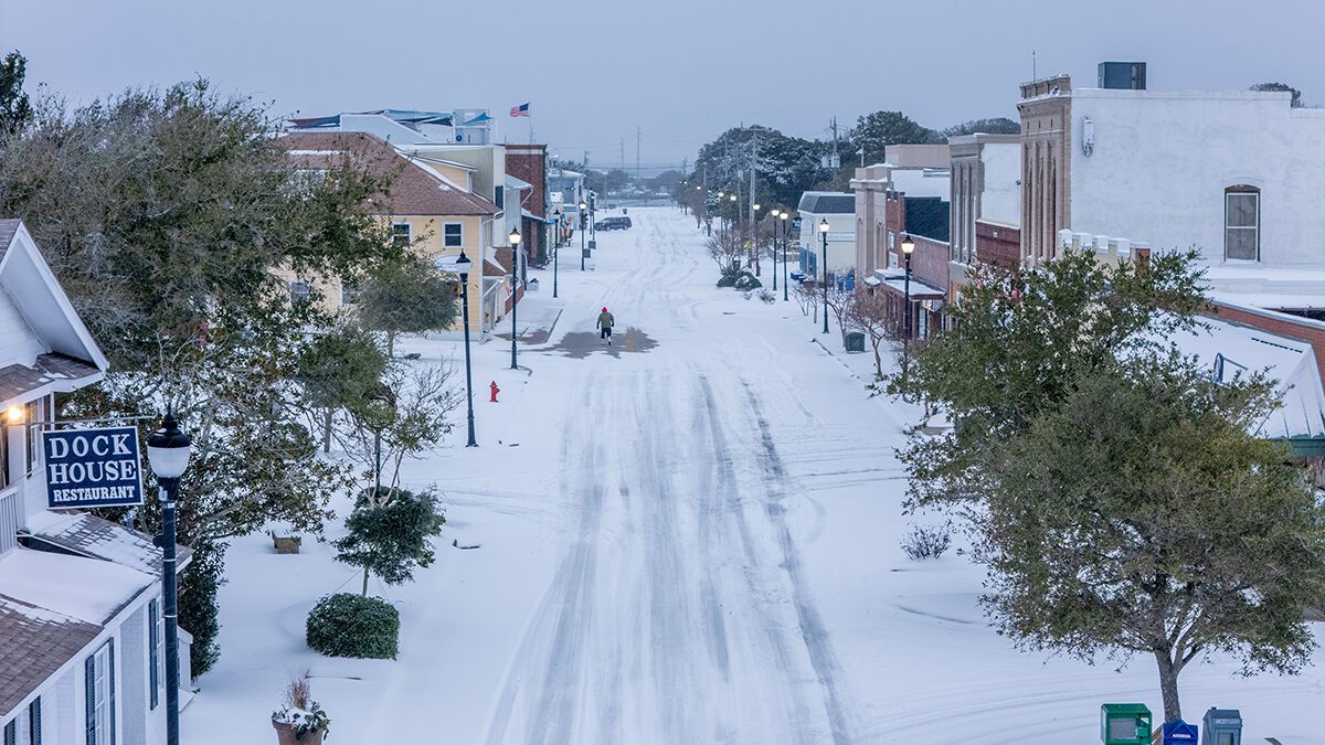 Snow covers Front Street in Beaufort Wednesday morning as the winter storm continues to blanket Carteret County and much of coastal North Carolina. Photo: Dylan Ray