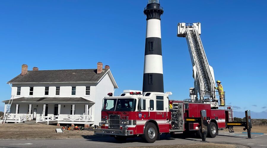 A Roanoke Island Volunteer Fire Department is shown parked next to the Bodie Island Double Keepers’ Quarters in this National Park Service photo released Tuesday.