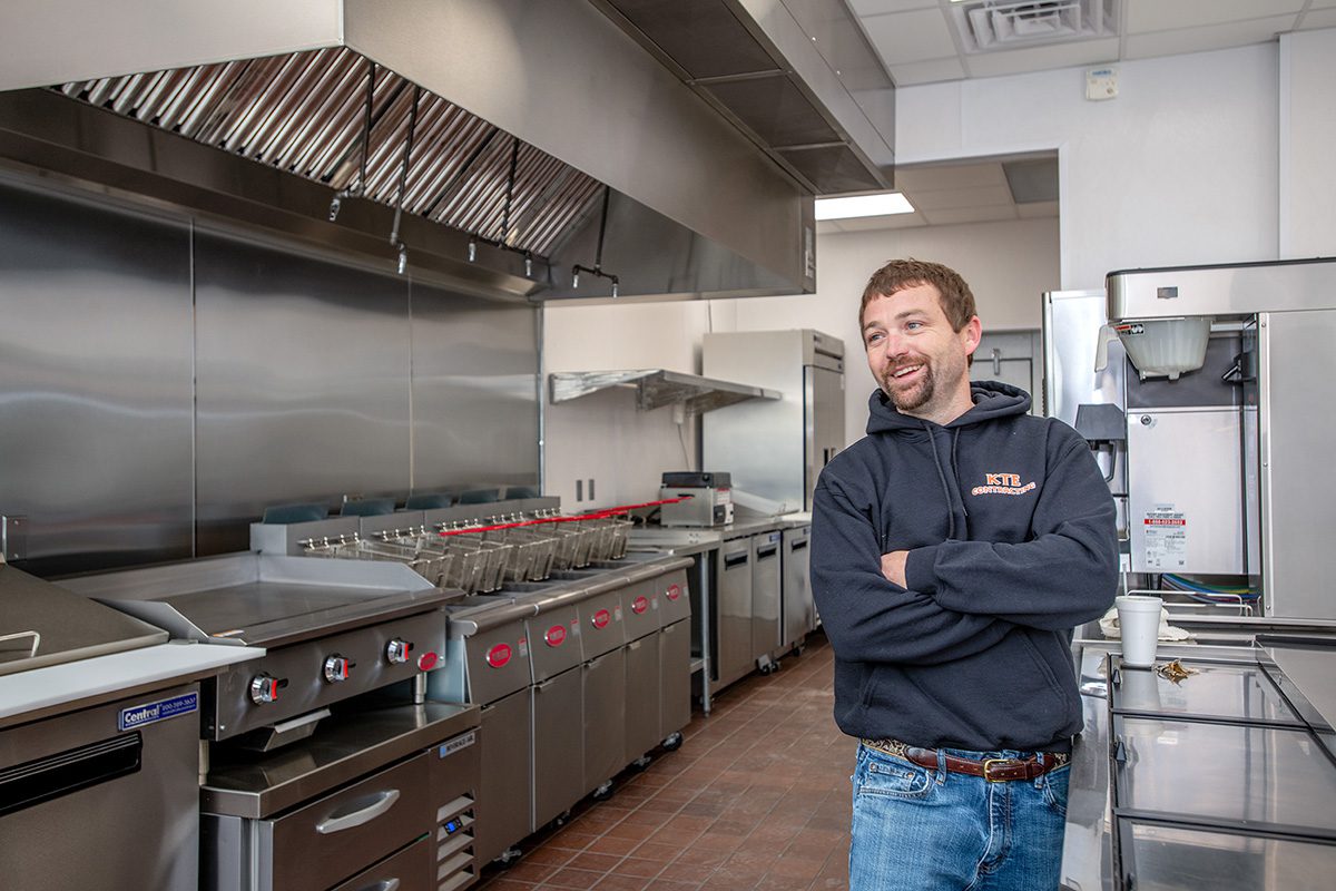 Shelton Franks stands in the newly rebuilt El's Drive-In on Arendell Street in Morehead City. Photo: Dylan Ray