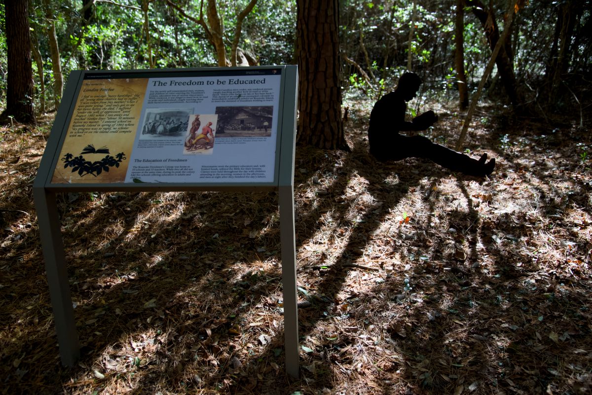 "The Freedom to be Educated" sign and silhouette of London Ferebee, who helped educate others at the Freedmen's Colony. Photo: Kip Tabb