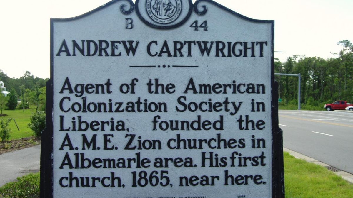 The N.C. Highway Marker posted on U.S. 64 southeast of Manteo reads, "Andrew Cartwright --Agent of the American Colonization Society in Liberia, founded the A.M.E. Zion churches in Albemarle area. His first church, 1865, near here." Photo: N.C. Department of Natural and Cultural Resources