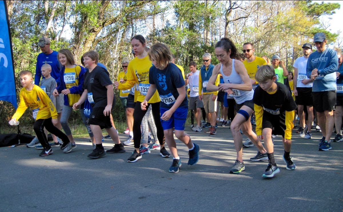 Runners at the start line during a past Core Sound Run at the Core Sound Waterfowl Museum and Heritage Center on Harkers Island. Photo: Core Sound