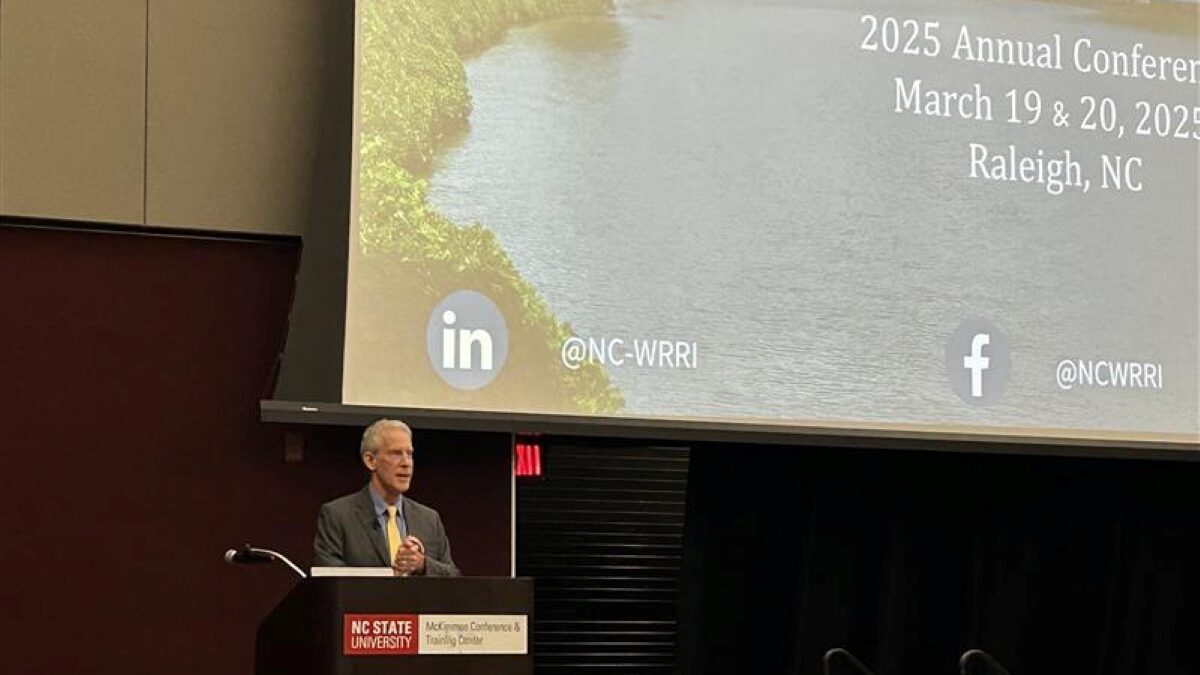 Department of Environmental Quality Secretary Reid Wilson speaks during the 2025 N.C. Water Resources Research Institute's annual conference Thursday. Photo: NCDEQ