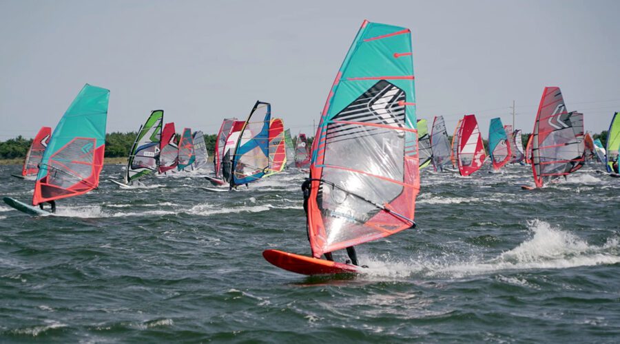 Windsurfers compete at Hatteras Island where Canadian visitors have typically represented a significant portion of visitors, according to one business here. Photo courtesy d to Britt Viehman/OceanAir Sports