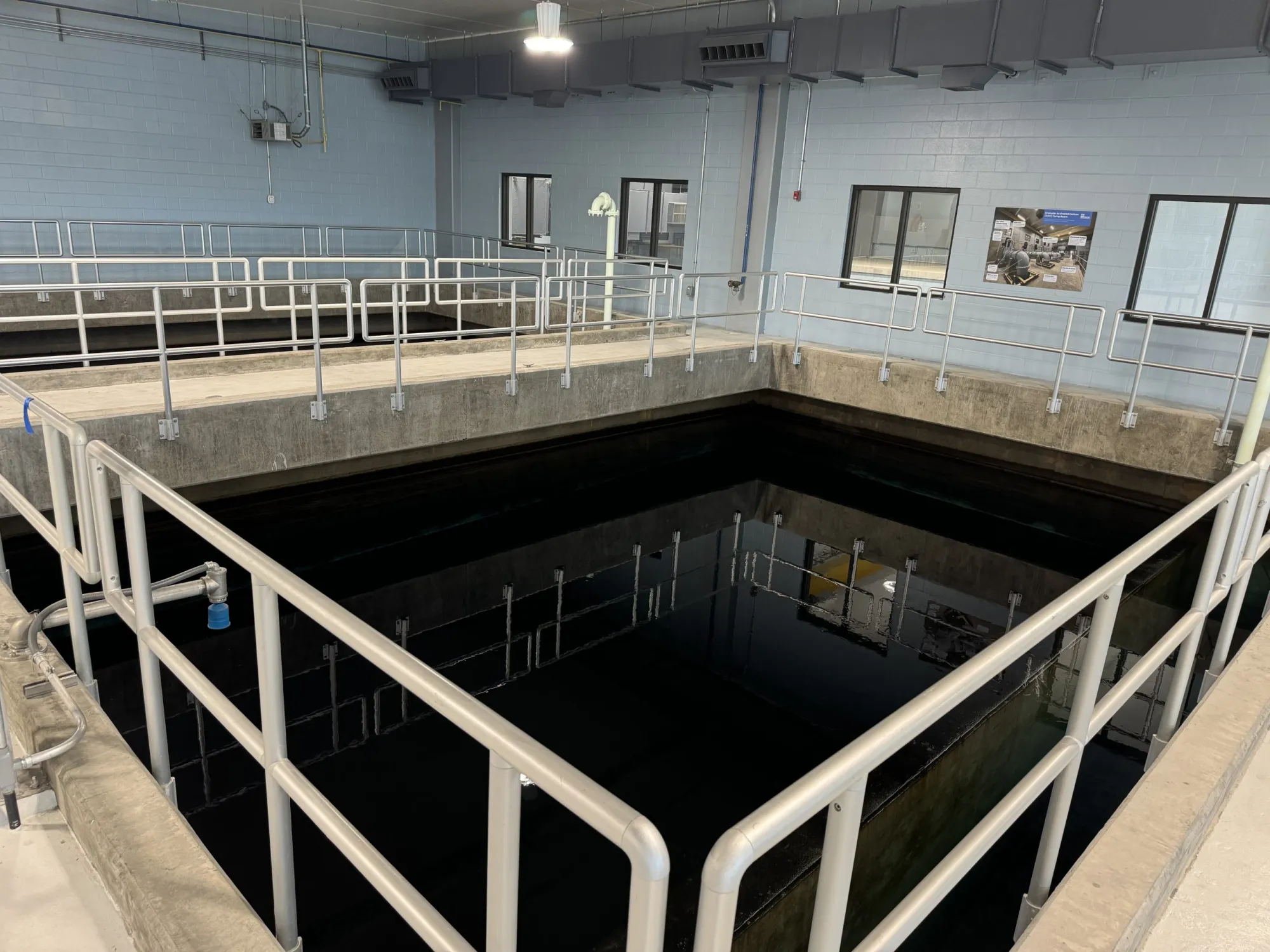 At the Cape Fear Public Utility Authority's Sweeney Treatment Plant, water flows into deep granular activated carbon filters, which remove PFAS. Then, the water receives ultraviolet disinfection before entering a finished water storage tank. Credit: Will Atwater
