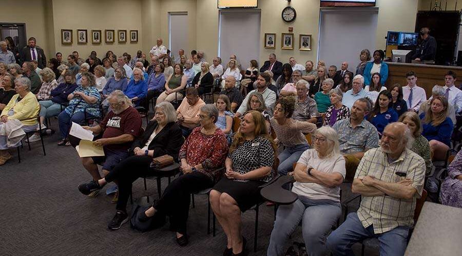 It was standing room only as the Dare County Board of Commissioners met to discuss the fate of a controversial zone of influence amendment. Photo: Kip Tabb