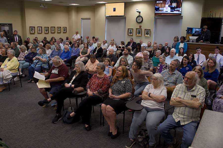 It was standing room only as the Dare County Board of Commissioners met to discuss the fate of a controversial zone of influence amendment. Photo: Kip Tabb