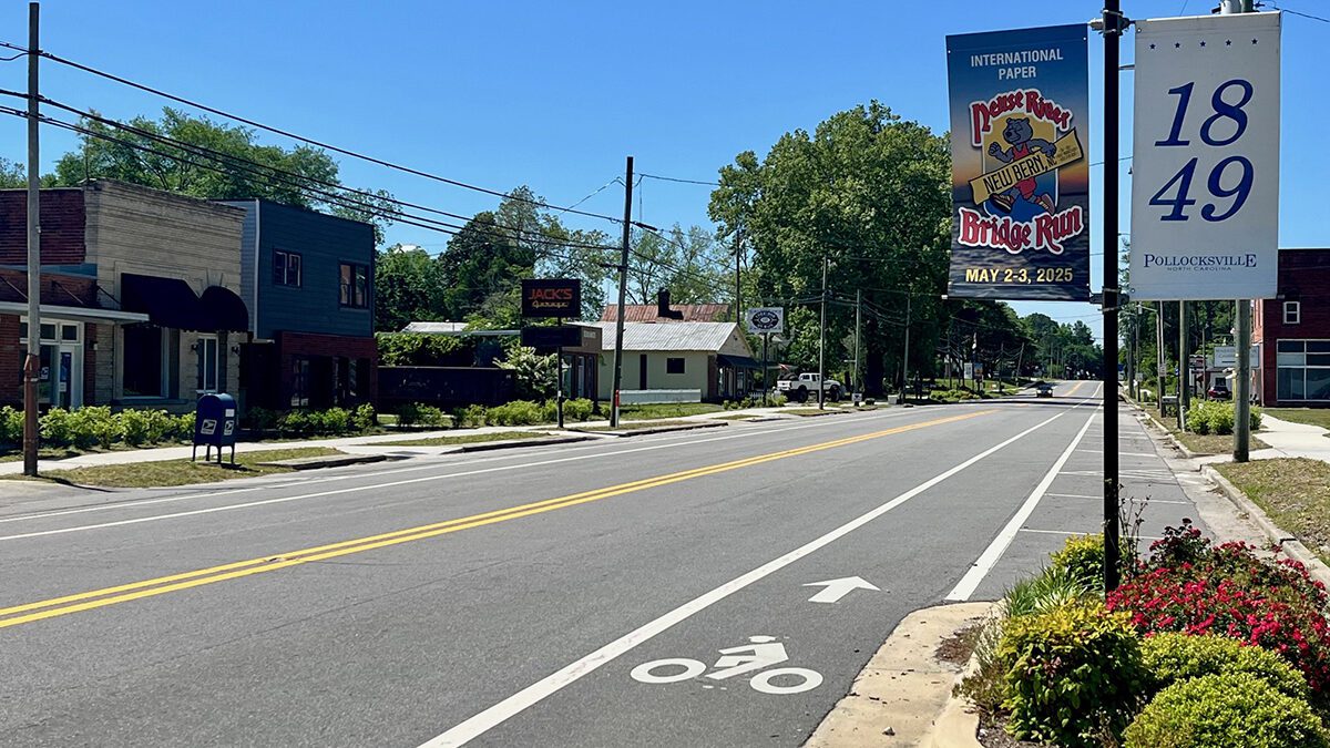A bike path, banners and planters are displayed along U.S. Highway 17, Pollocksville's main street. Photo: Frank Tursi