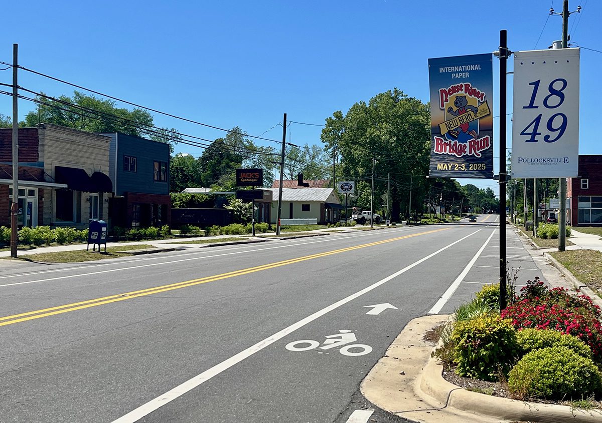 A bike path, banners and planters are displayed along U.S. Highway 17, Pollocksville's main street. Photo: Frank Tursi