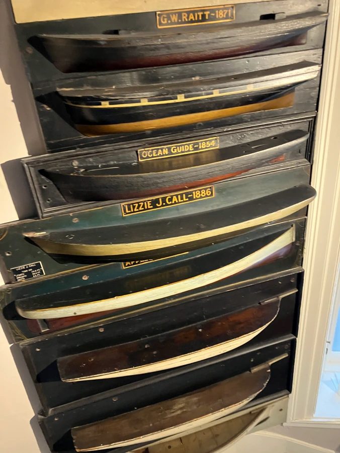A few of the 19th-century half-hull ship models in the Athenaeum’s collection. Shipbuilders used such models extensively in constructing sailing vessels in the Age of Sail, as well as in documenting the dimensions and character of vessels that were built. Photo: David Cecelski