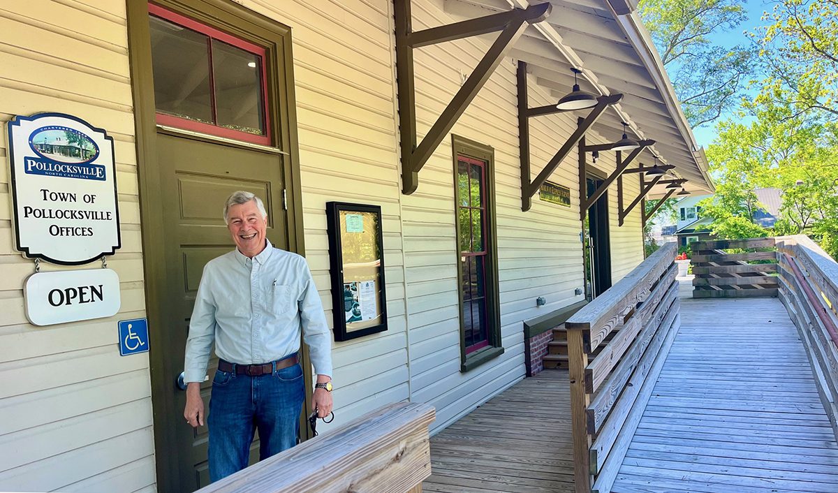 Pollocksville Mayor Jay Bender beams with pride outside the relocated and renovated town hall. Photo: Frank Tursi