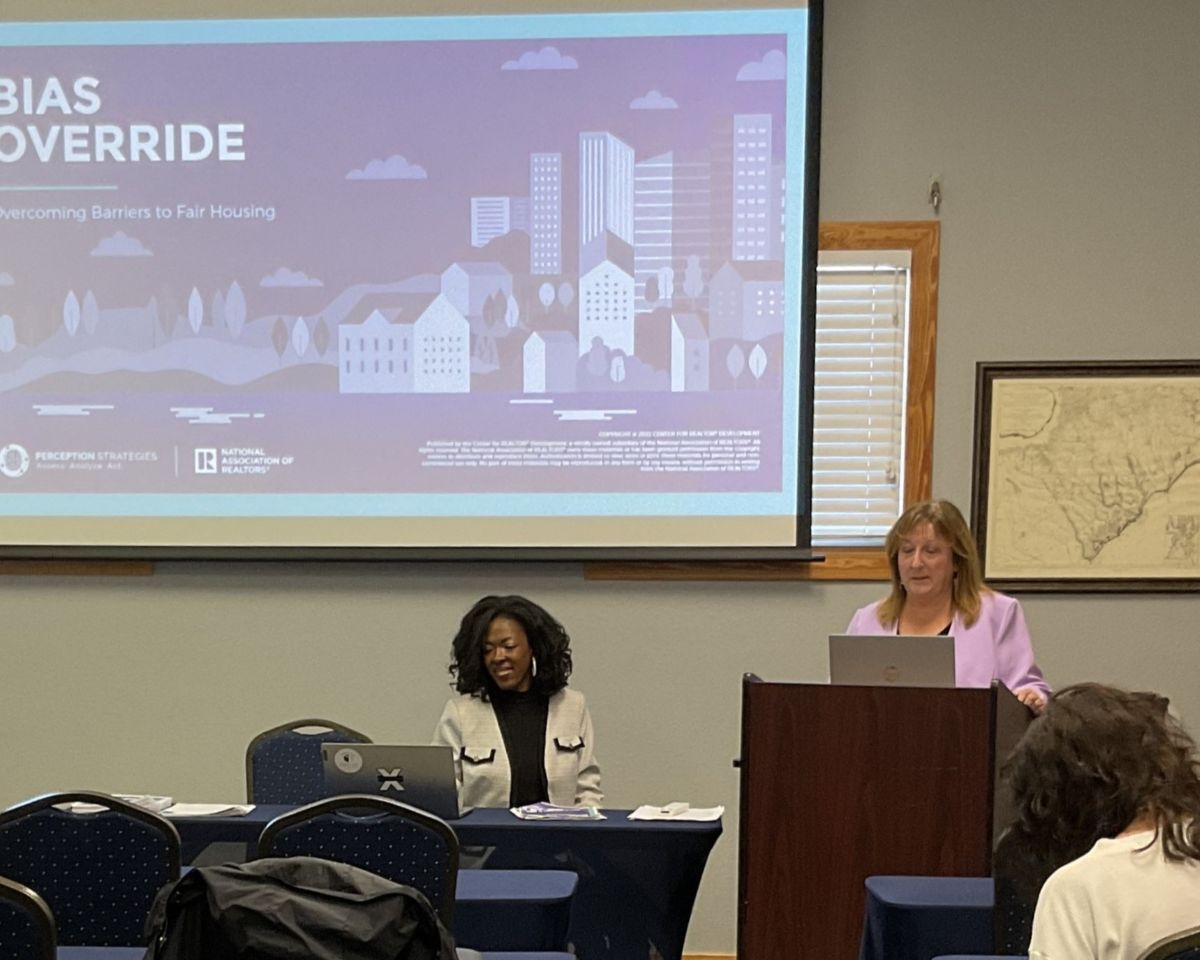 N.C. Realtors Diversity Committee 2024 Chair Tikola McCree, left, and Outer Banks Association of Realtors President Christi Bryant during a course on overcoming barriers to fair housing. Photo: Outer Banks Association of Realtors