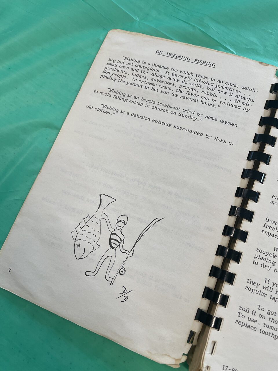 Page 2 of "Ms. Winnie's Ocean City Seafood Cookbook" provides a brief history and definition of fishing.
