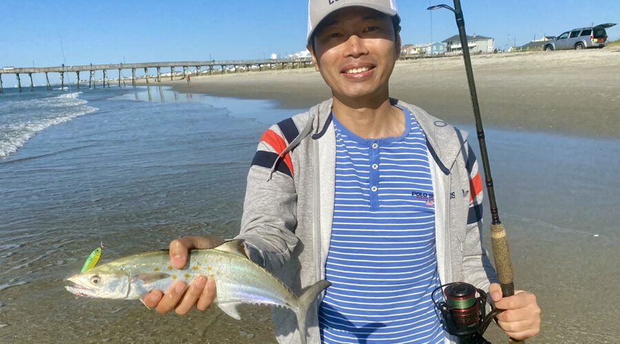 Shintaro Bunya of Cary shows that we can catch Spanish mackerel on the beach. Photo: Gordon Churchill