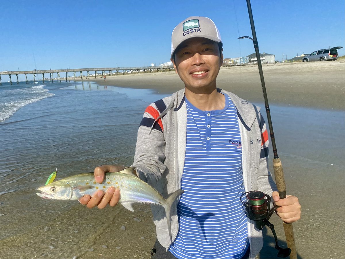 Shintaro Bunya of Cary shows that we can catch Spanish mackerel on the beach. Photo: Gordon Churchill