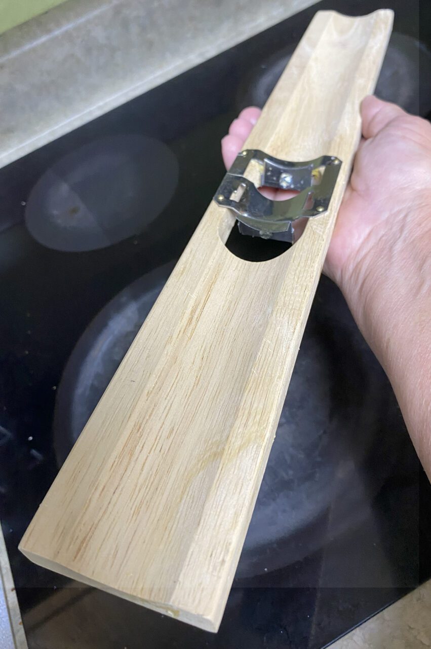 While you can use a knife to cut corn off the cob, this corn cutter, sometimes called a stripper or thresher, makes removing the corn from the cob much easier. Photo: Heidi Skinner